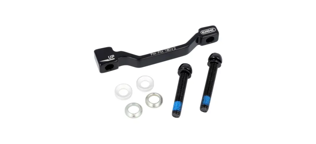 ADAPTADOR PARA CALIPER ELVEDES POST MOUNT COMPATIBLE C/DISCOS FRONTALES 180MM